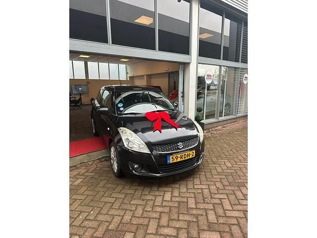 Zwart Occasion 2011 Suzuki Swift Exclusive Hatchback | € 2.977 (Eerlijke prijs) - Afbeelding 1/4