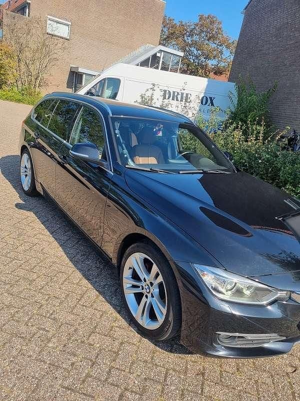 Bruin Gebruikt 2015 BMW 316 Executive Stationwagen | € 13.200 (Iets duurder) - Afbeelding 1/4