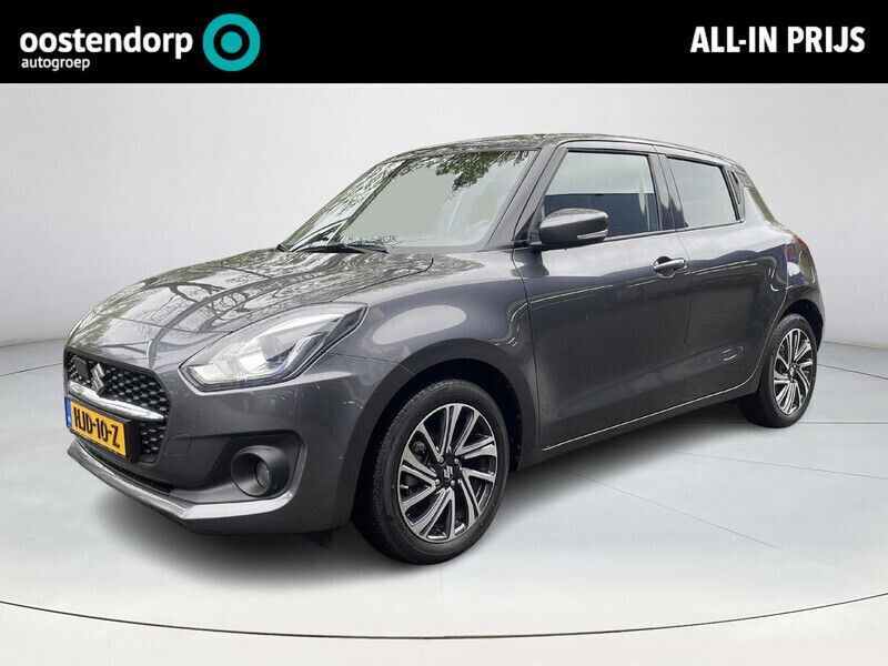 Grijs Gebruikt 2023 Suzuki Swift Style Hatchback | € 22.440 (Eerlijke prijs) - Afbeelding 1/4
