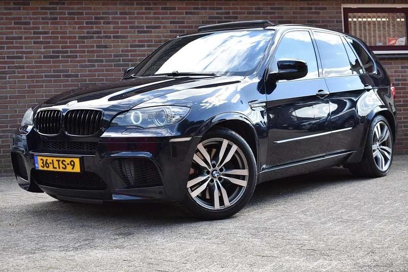 Zwart Gebruikt 2010 BMW X5 SUV | € 19.949 - Afbeelding 1/4
