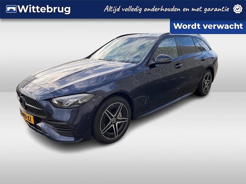 Blauw (metallic) Gebruikt 2022 Mercedes C300 AMG line Stationwagen | € 39.950 (Eerlijke prijs) - Afbeelding 1/2