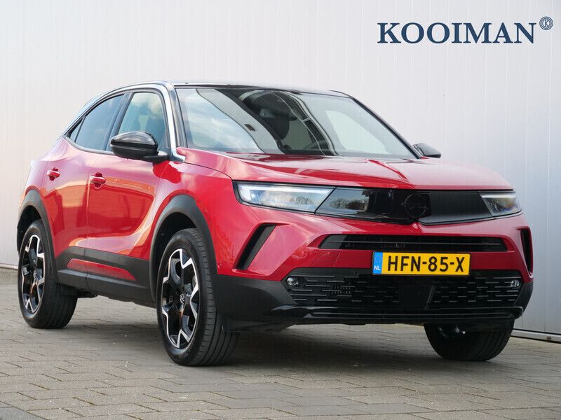 Rood, metallic lak Gebruikt 2024 Opel Mokka Ultimate SUV | € 27.945 (Eerlijke prijs) - Afbeelding 1/4