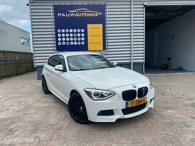 Wit Gebruikt 2012 BMW 114 Executive Hatchback | € 6.450 (Eerlijke prijs) - Afbeelding 1/4