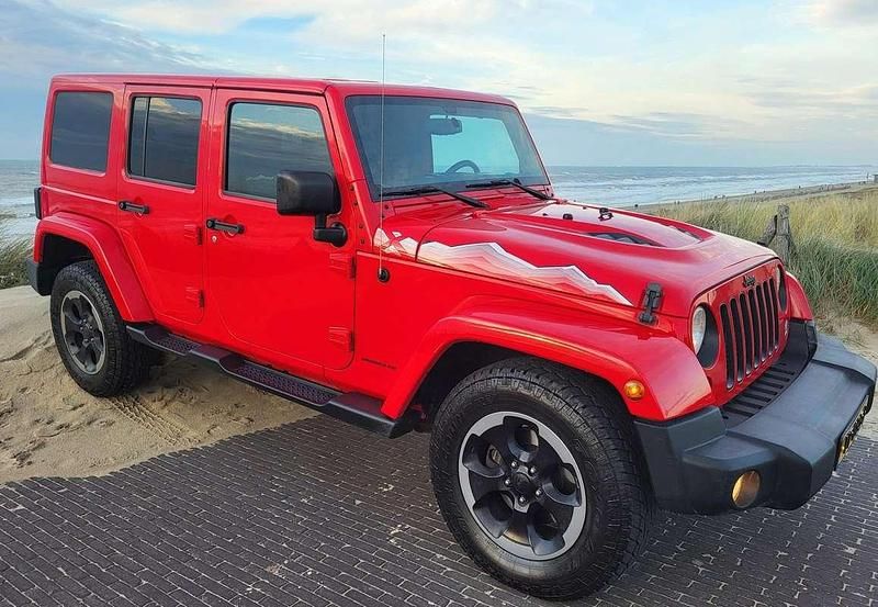 Rood Occasion 2016 Jeep Wrangler Unlimited SUV | € 28.950 - Afbeelding 1/4