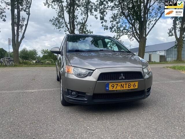 Grijs Gebruikt 2010 Mitsubishi Colt Edition Hatchback | € 3.900 (Eerlijke prijs) - Afbeelding 1/4