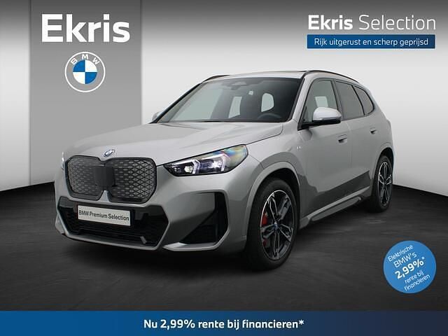 Grijs Gebruikt 2025 BMW iX1 M Sport SUV | € 61.950 - Afbeelding 1/4