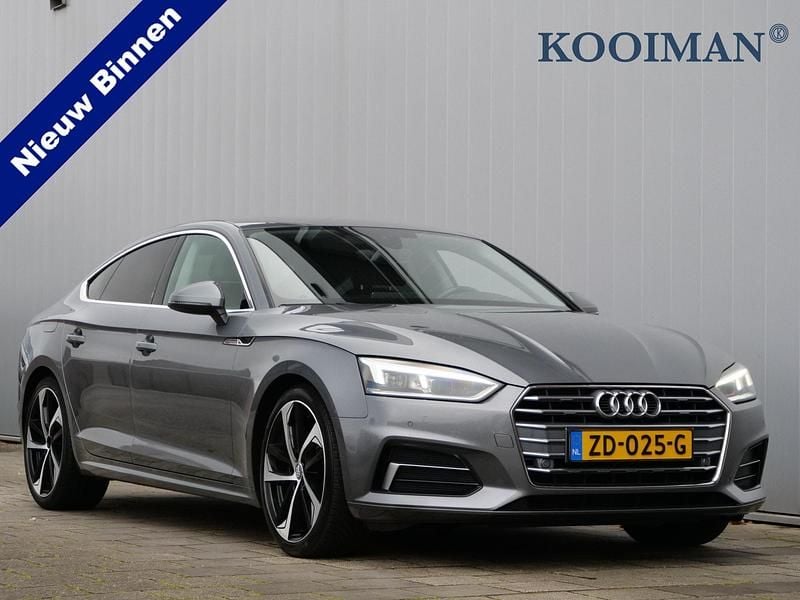 Grijs Gebruikt 2018 Audi A5 Design Hatchback | € 24.450 (Eerlijke prijs) - Afbeelding 1/4