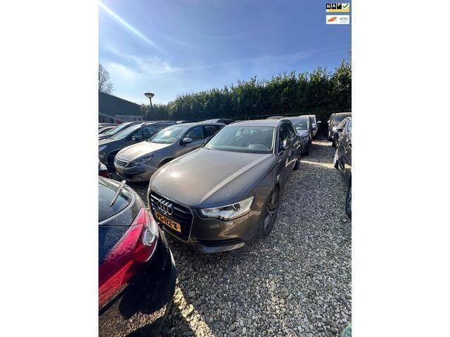 Grijs Gebruikt 2014 Audi A6 Sport Stationwagen | € 9.950 - Afbeelding 1/4