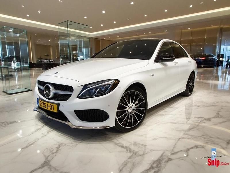 Wit Occasion 2015 Mercedes C400 Prestige Sedan | € 34.950 (Iets duurder) - Afbeelding 1/4