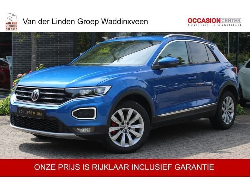 Blauw, metallic lak Gebruikt 2018 VW T-Roc Sportline SUV | € 21.950 (Eerlijke prijs) - Afbeelding 1/4