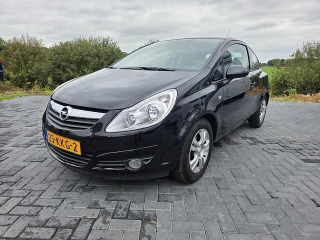 Zwart Gebruikt 2009 Opel Corsa Enjoy Hatchback | € 1.950 (Goede deal) - Afbeelding 1/4