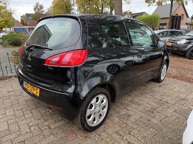 Occasion Mitsubishi Colt 95 PK (69 kW) 2005 Zwart Hatchback