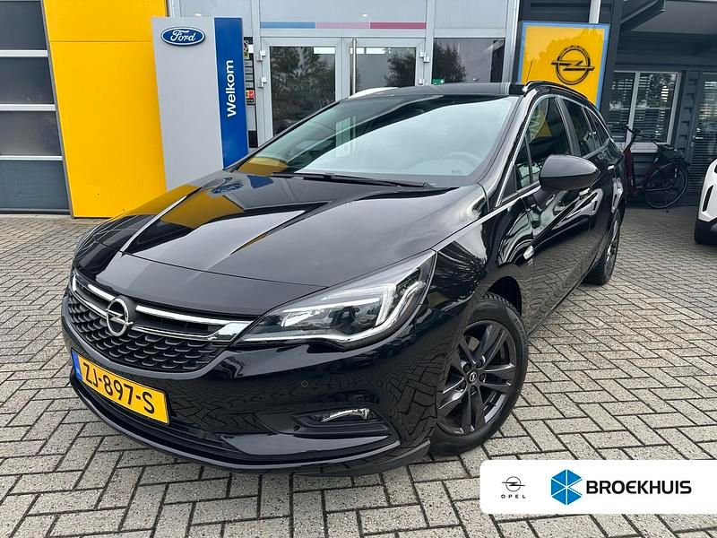 Zwart Gebruikt 2019 Opel Astra Edition Stationwagen | € 15.095 (Eerlijke prijs) - Afbeelding 1/4