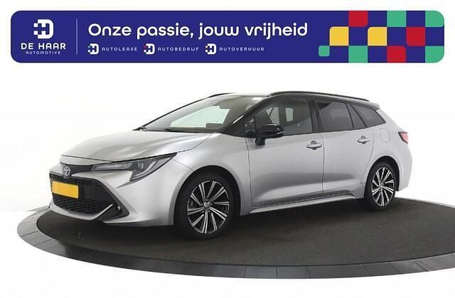 Zilver Gebruikt 2023 Toyota Corolla Hybrid Executive Stationwagen | € 28.900 (Goede deal) - Afbeelding 1/4