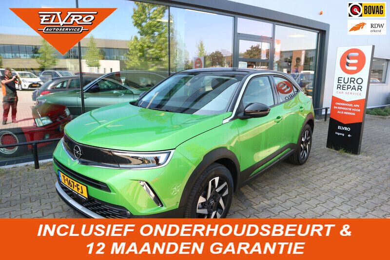 Groen, metallic lak Gebruikt 2021 Opel Mokka Elegance SUV | € 19.950 (Eerlijke prijs) - Afbeelding 1/4