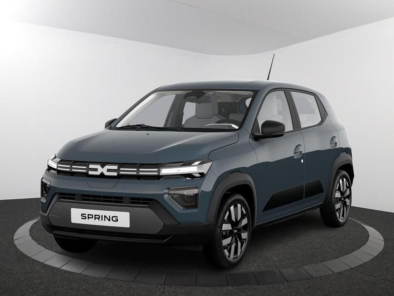 Rouge brick (rood metallic) Gebruikt 2024 Dacia Spring Expression Hatchback | € 17.683 (Iets duurder) - Afbeelding 1/4