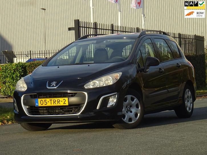 Zwart Gebruikt 2012 Peugeot 308 Stationwagen | € 1.999 (Eerlijke prijs) - Afbeelding 1/4