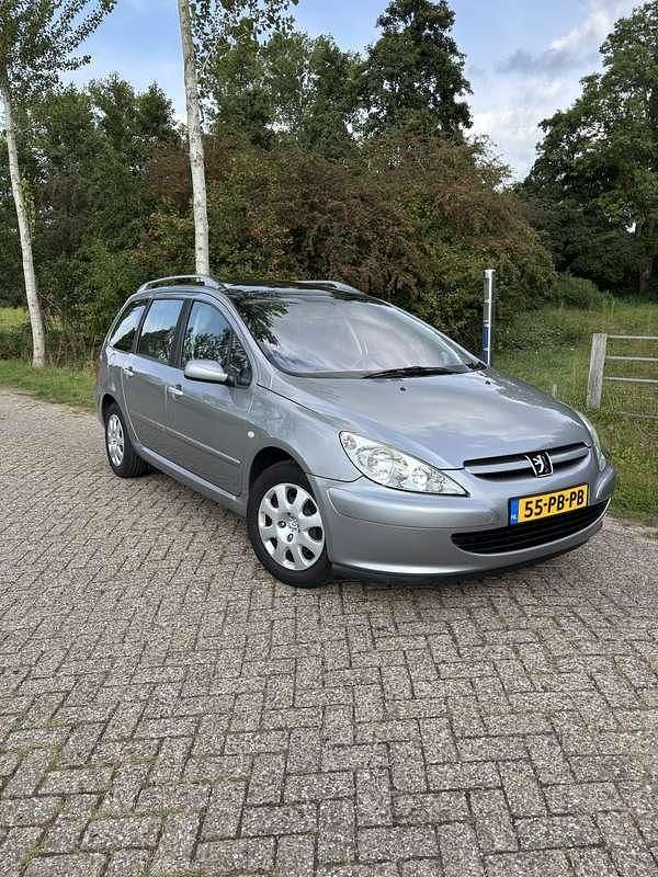 Grijs Gebruikt 2004 Peugeot 307 Stationwagen | € 1.350 (Eerlijke prijs) - Afbeelding 1/4