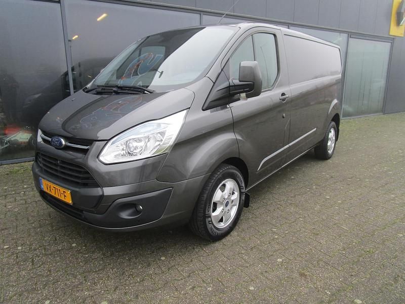 Grijs (metallic) Occasion 2016 Ford Transit Custom Limited Van | € 13.250 (Eerlijke prijs) - Afbeelding 1/4