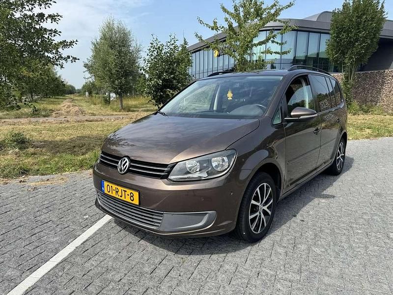 Bruin Gebruikt 2011 VW Touran MPV | € 5.750 (Eerlijke prijs) - Afbeelding 1/4