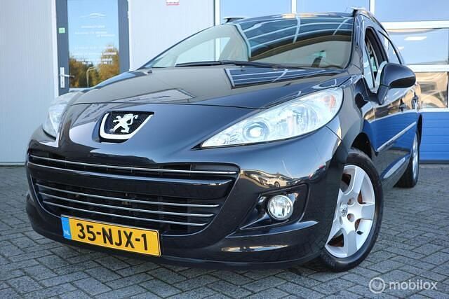 Zwart Gebruikt 2010 Peugeot 207 CC Cabriolet | € 2.800 (Super prijs) - Afbeelding 1/4