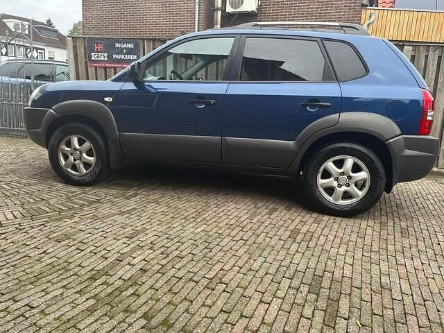 Blauw Gebruikt 2005 Hyundai Tucson Dynamiq SUV | € 1.999 (Goede deal) - Afbeelding 1/4
