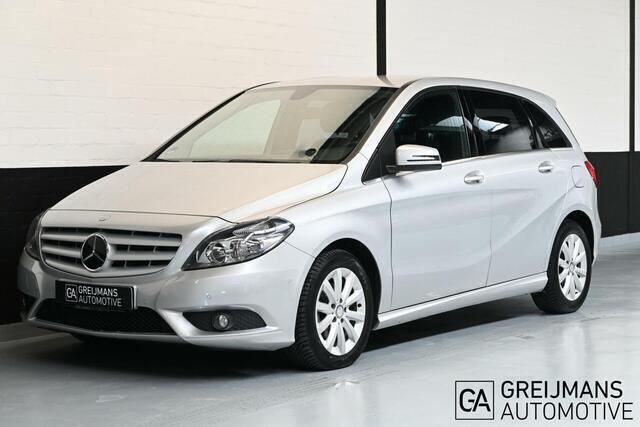 Grijs, metallic lak Gebruikt 2014 Mercedes B180 Ambition MPV | € 11.995 (Goede deal) - Afbeelding 1/4