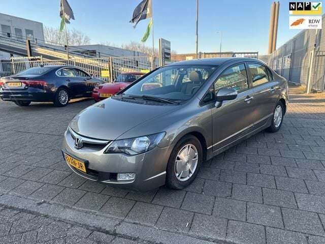 Grijs Gebruikt 2007 Honda Civic Hybrid Sedan | € 2.749 (Super prijs) - Afbeelding 1/4