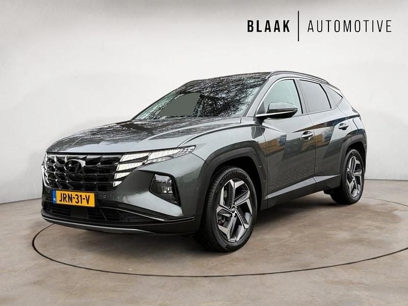 Grijs Occasion 2022 Hyundai Tucson Premium SUV | € 32.900 (Eerlijke prijs) - Afbeelding 1/4