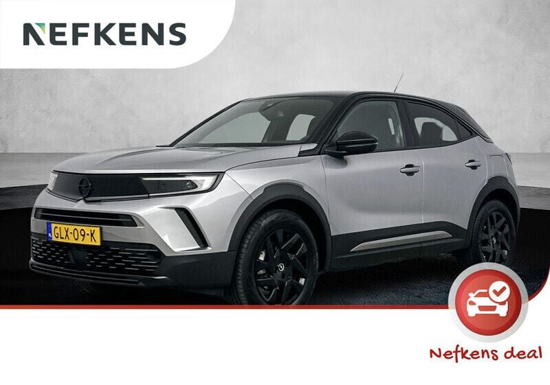 Grijs Gebruikt 2024 Opel Mokka SUV | € 28.925 - Afbeelding 1/4