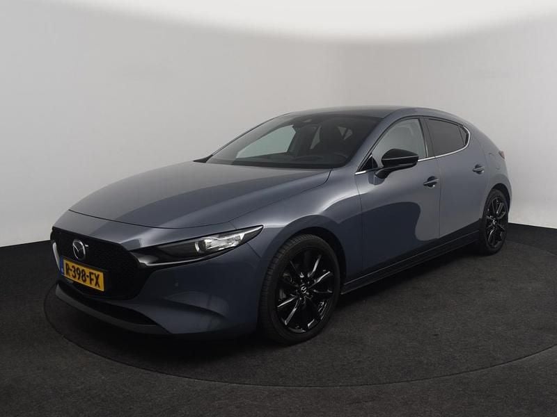 Polymetal gray (grijs metallic) Gebruikt 2022 Mazda 3 Sportive Hatchback | € 24.850 (Eerlijke prijs) - Afbeelding 1/4