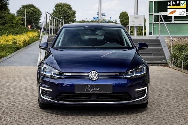 Blauw, metallic lak Gebruikt 2019 VW e-Golf Hatchback | € 11.350 (Eerlijke prijs) - Afbeelding 1/4