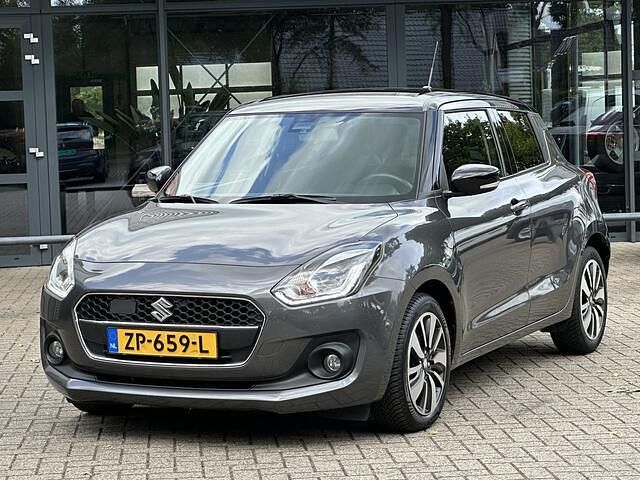 Grijs Gebruikt 2019 Suzuki Swift Style Hatchback | € 12.399 (Goede deal) - Afbeelding 1/4