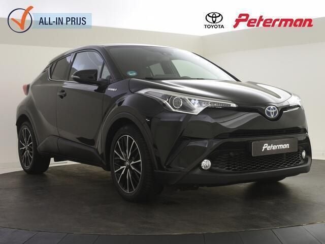 Zwart Gebruikt 2016 Toyota C-HR Executive SUV | € 17.899 (Eerlijke prijs) - Afbeelding 1/4