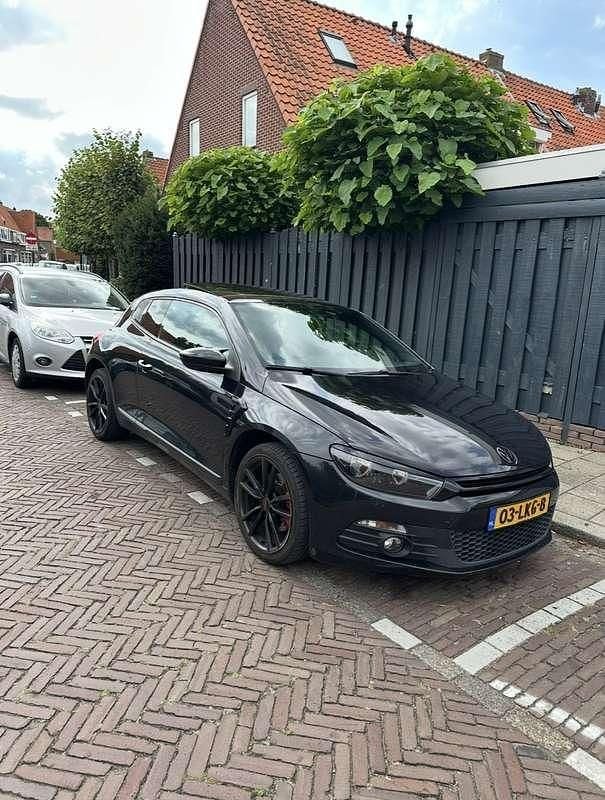Zwart Gebruikt 2010 VW Scirocco Highline Coupé | € 7.900 (Duur) - Afbeelding 1/4