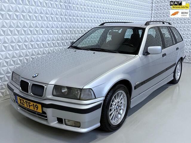 Grijs Gebruikt 1999 BMW 323 Sport Line Stationwagen | € 7.500 (Eerlijke prijs) - Afbeelding 1/4