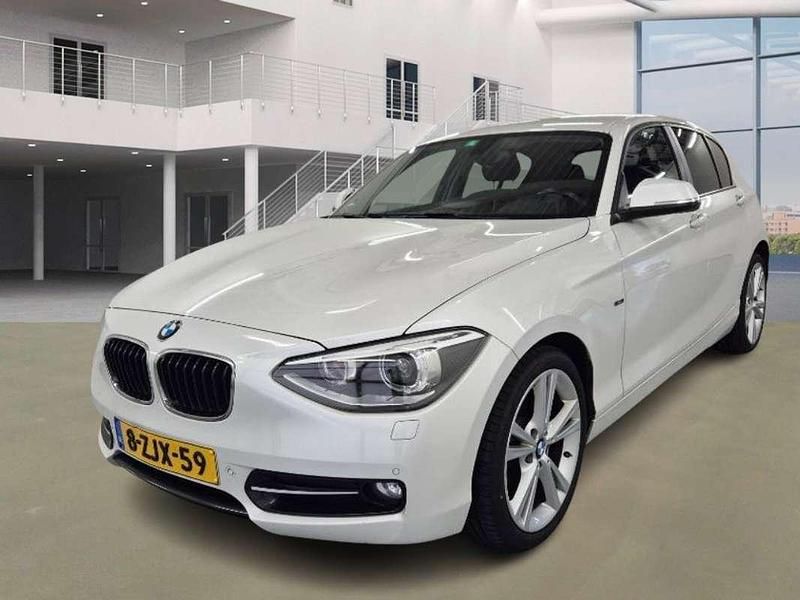 Wit Gebruikt 2015 BMW 116 Executive Hatchback | € 8.995 (Super prijs) - Afbeelding 1/4