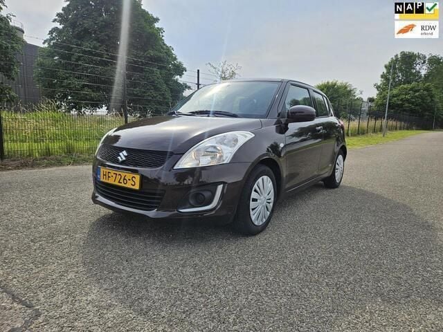 Bruin Gebruikt 2015 Suzuki Swift Comfort Hatchback | € 9.450 (Eerlijke prijs) - Afbeelding 1/4