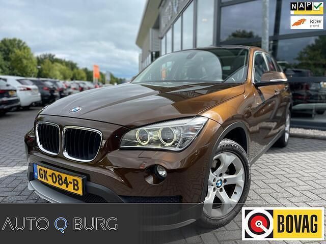 Bruin Gebruikt 2015 BMW X1 SUV | € 12.950 (Goede deal) - Afbeelding 1/4