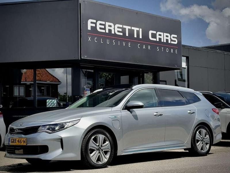 Grijs Gebruikt 2017 Kia Optima Hybrid Sedan | € 14.900 (Eerlijke prijs) - Afbeelding 1/4