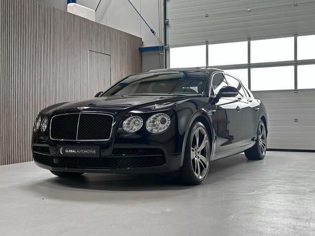 Blauw, metallic lak Gebruikt 2016 Bentley Flying Spur Sedan | € 94.990 - Afbeelding 1/4