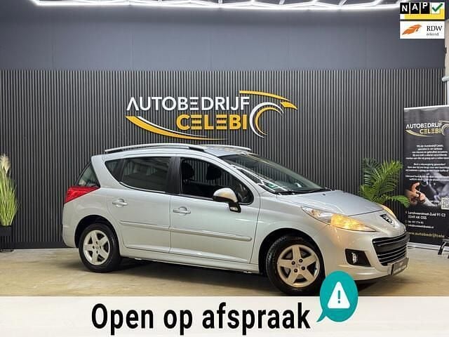 Grijs Gebruikt 2010 Peugeot 207 Style Stationwagen | € 2.345 (Eerlijke prijs) - Afbeelding 1/4