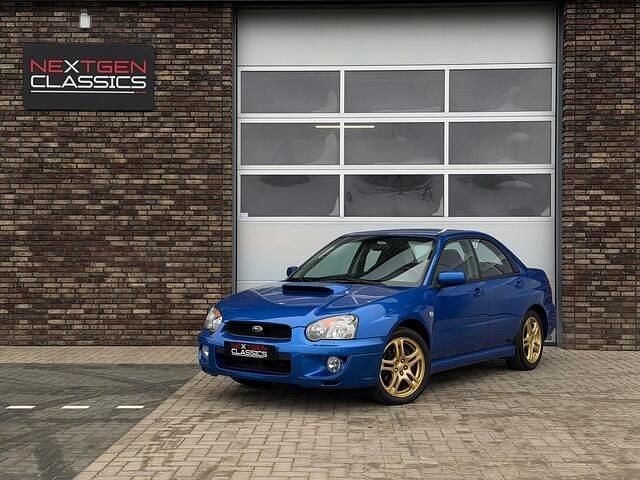 Blauw Gebruikt 2004 Subaru Impreza Sedan | € 22.950 (Goede deal) - Afbeelding 1/4