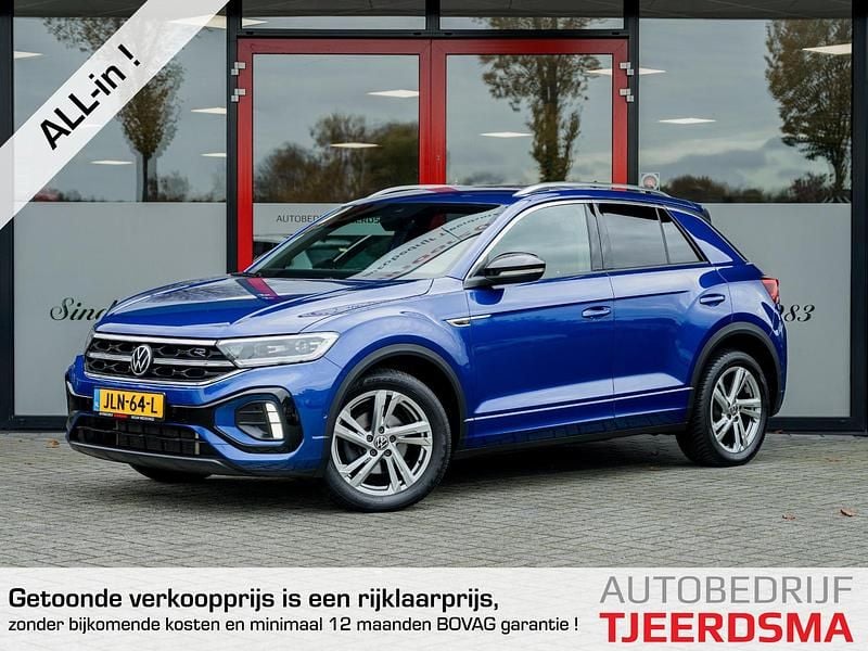 Blauw Gebruikt 2023 VW T-Roc R-line SUV | € 28.950 (Eerlijke prijs) - Afbeelding 1/4