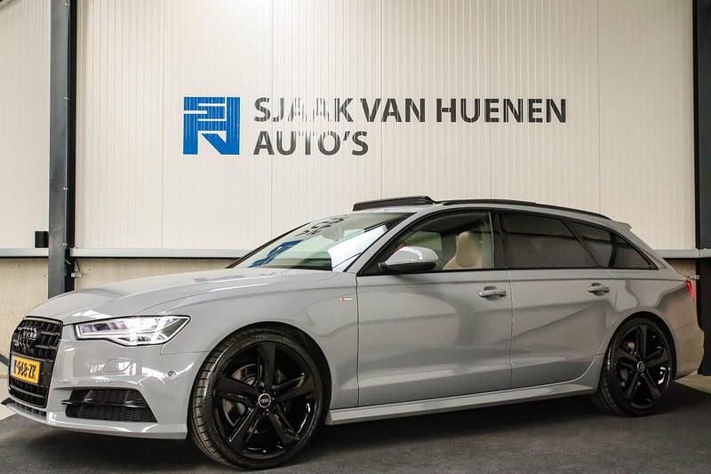 Ibis wit Gebruikt 2017 Audi A6 S-Line Stationwagen | € 53.950 - Afbeelding 1/4