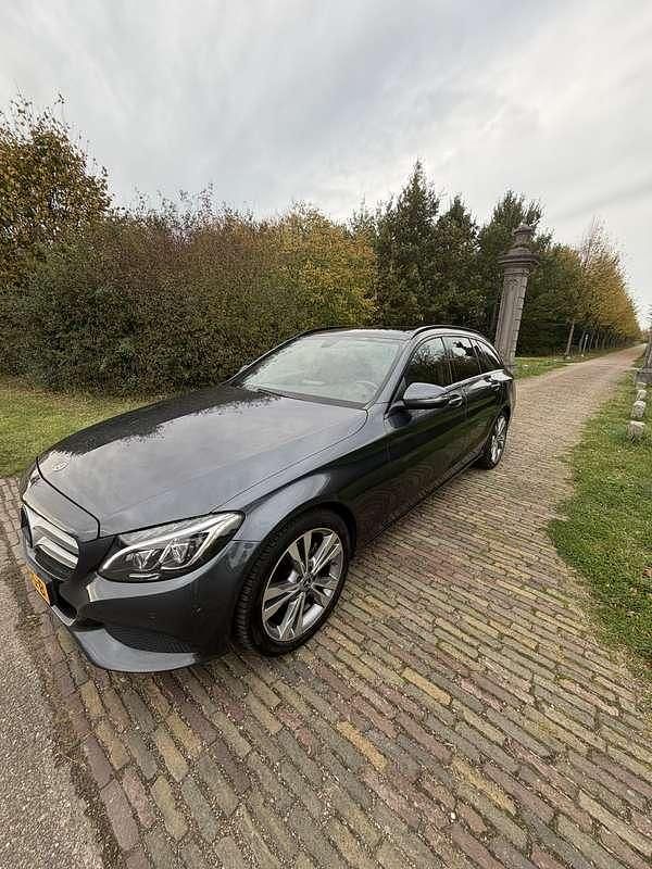 Grijs Gebruikt 2016 Mercedes C180 Ambition Stationwagen | € 14.900 (Super prijs) - Afbeelding 1/4