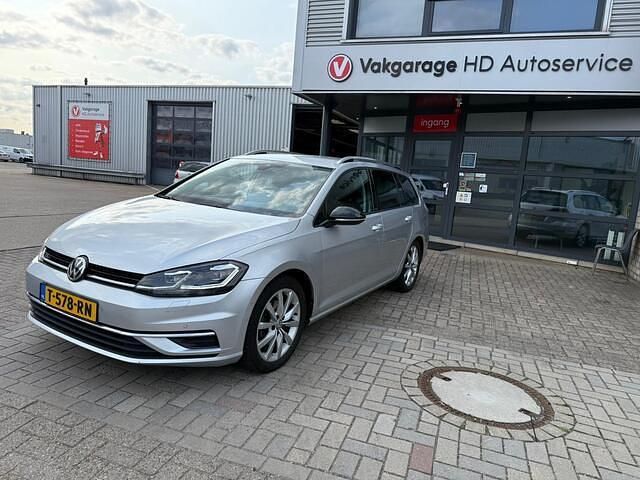 Grijs Gebruikt 2019 VW Golf VII Highline Stationwagen | € 16.950 (Eerlijke prijs) - Afbeelding 1/4