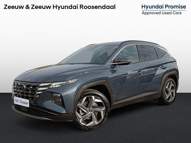 Dark teal metallic (tg8) Gebruikt 2022 Hyundai Tucson Premium SUV | € 28.740 (Goede deal) - Afbeelding 1/1