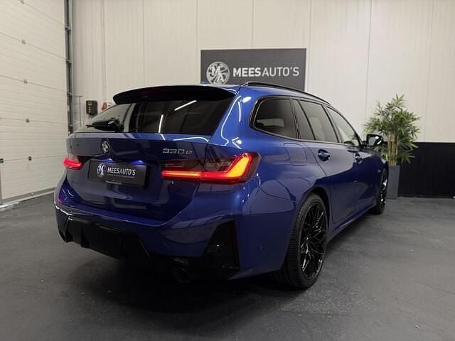 Occasion BMW 330 Executive 291 PK (214 kW) 2022 Blauw Stationwagen
