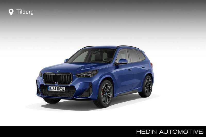 Blauw Nieuw 2025 BMW iX1 M Sport SUV | € 65.329 - Afbeelding 1/4
